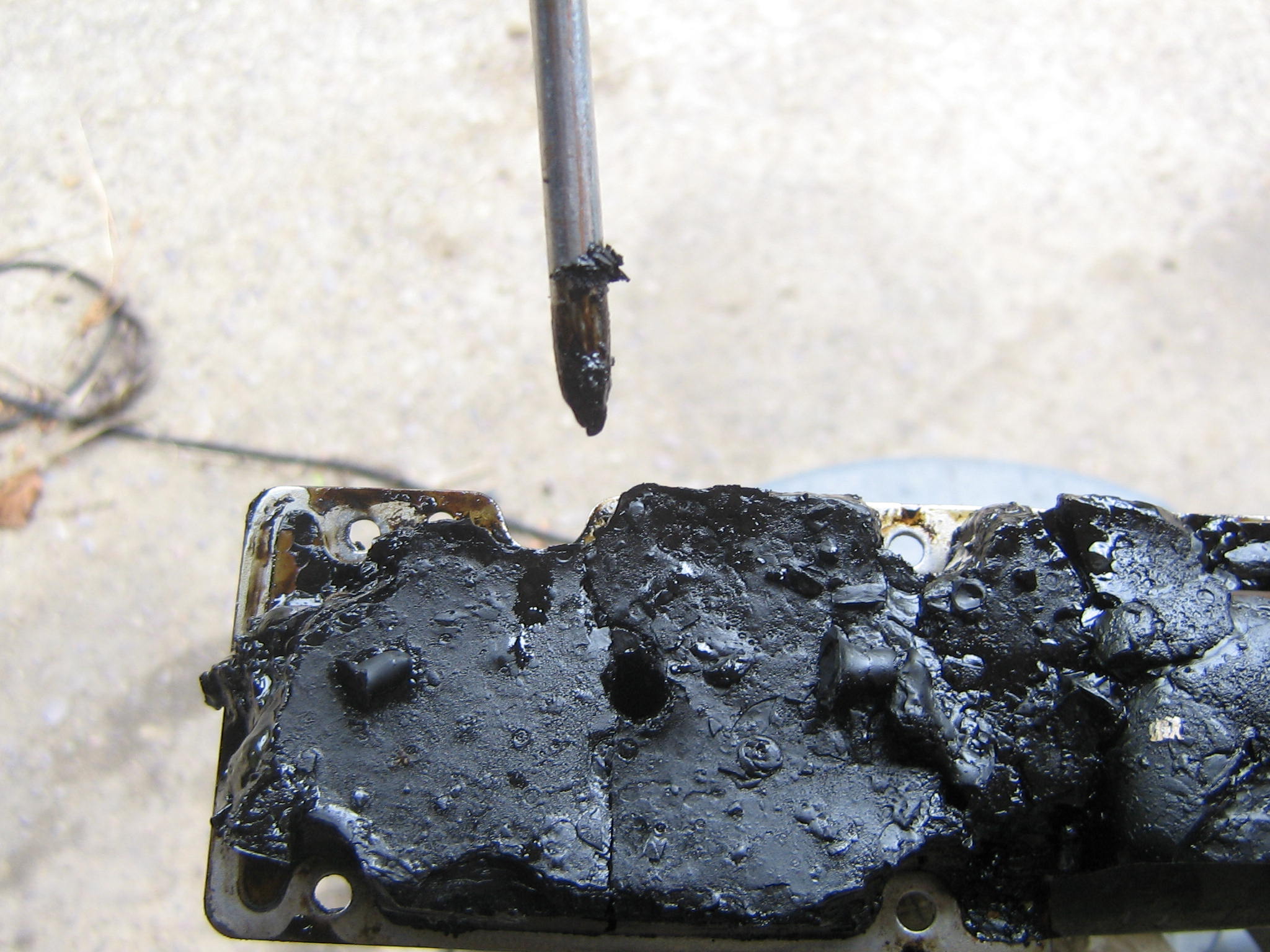 Engine sludge at least half inch thick